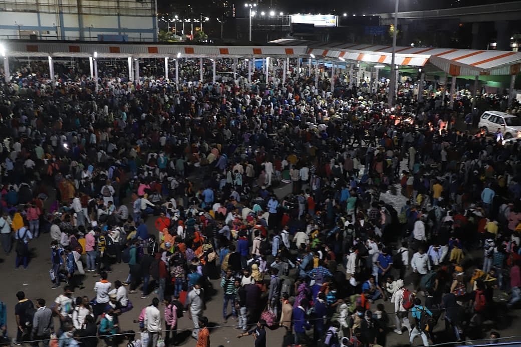 Amid Coronavirus Risk, Thousands Of Migrant Workers Queue At Delhi Bus Terminals To Leave For Hometowns