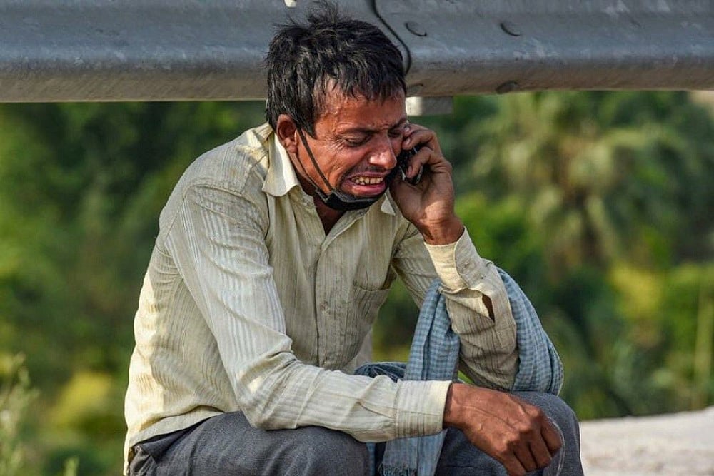 Just Wanted To See His Dying Son: Story Behind Photograph Of Crying Man That Shook India