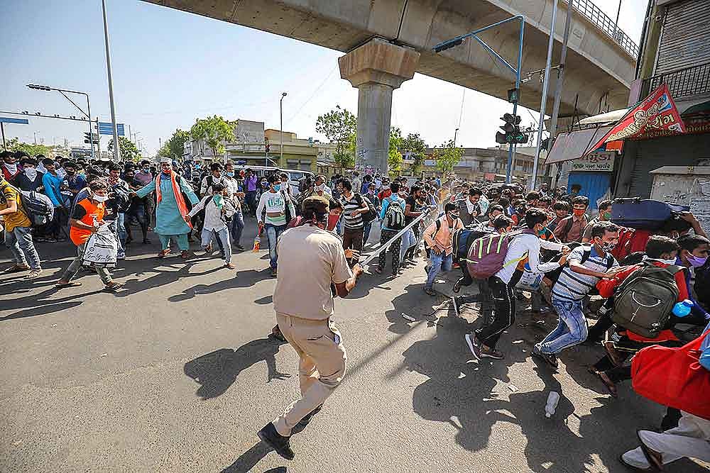 Migrants Pelt Stones In Ahmedabad, Police Uses Teargas To Disperse Crowd