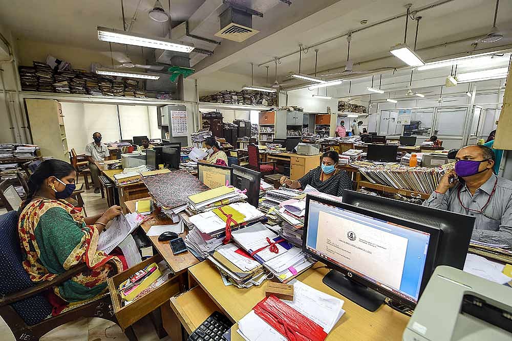 Employees work at the Secretariat after authorities eased restrictions, during the fourth phase of the ongoing COVID-19 nationwide lockdown, in Chennai.