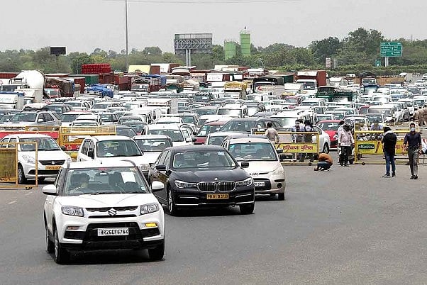 Traffic jam on Delhi-Gurugram road after the Haryana government sealed its border due to a sudden surge in coronavirus cases, during ongoing COVID-19 lockdown-4, in Gurugram.