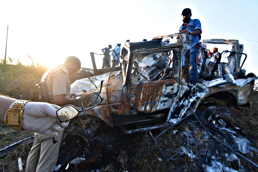 Freeze Frames In Lakhimpur Kheri: A Charred SUV, Toys On A Cart And A Young Man In A Red T Shirt