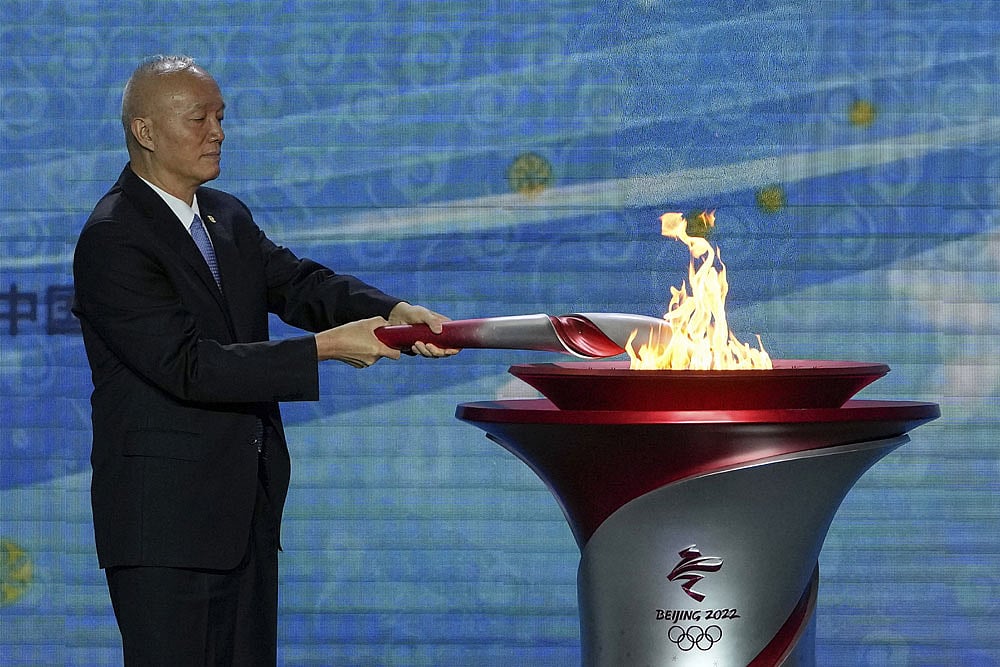Olympic Flame Arrives In Beijing For Winter Games Amid Boycott Calls