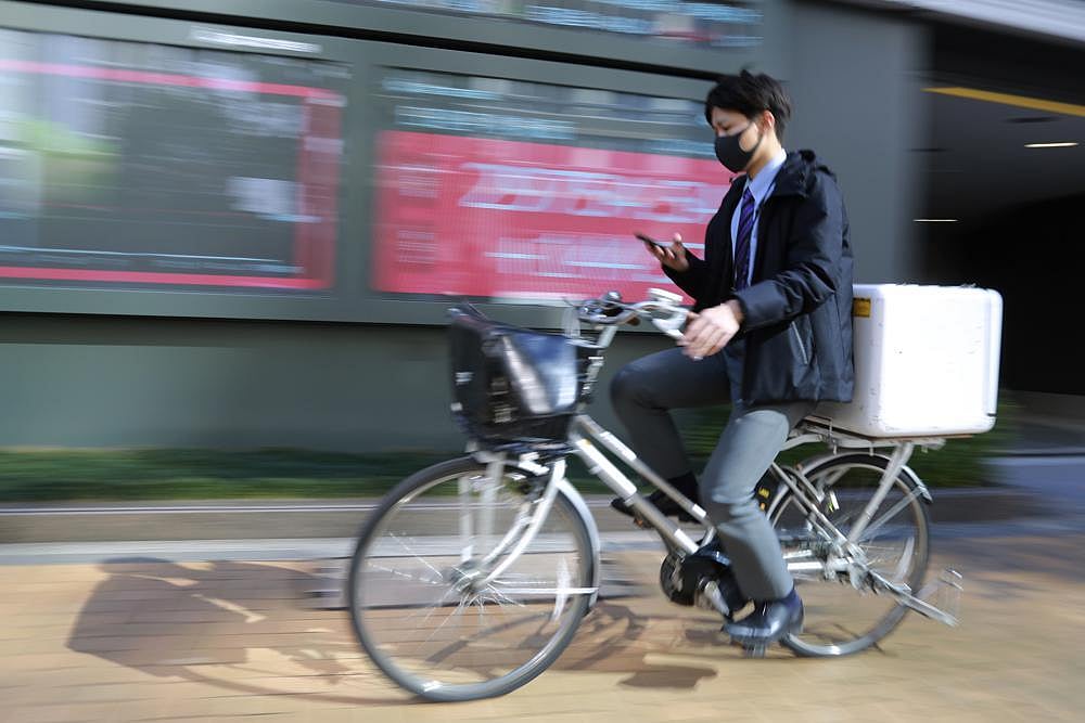Asian Shares Higher As Japan Says Economy Shrank In 3Q