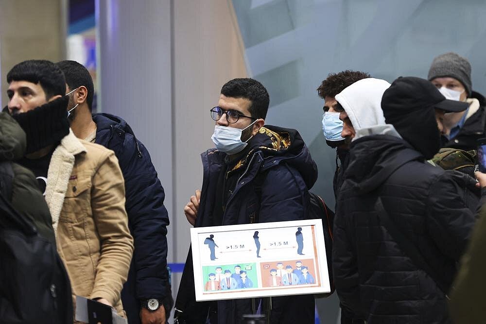 Iraqi Migrants Caught In Border Crisis In Belarus Fly Home