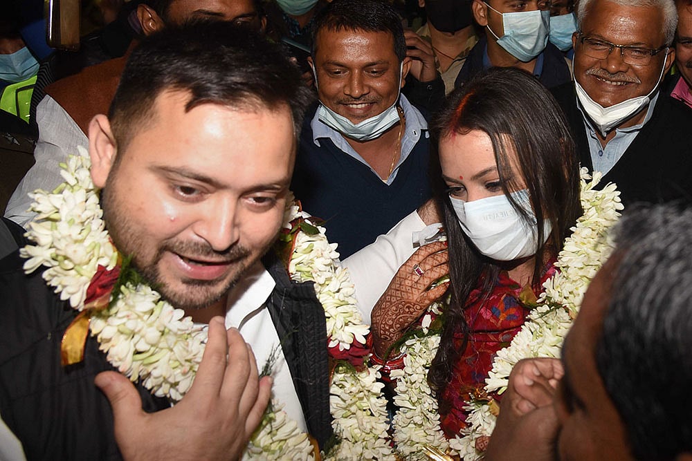 Tejashwi Reaches Patna With Wife, Lifts The Veil On Her Name