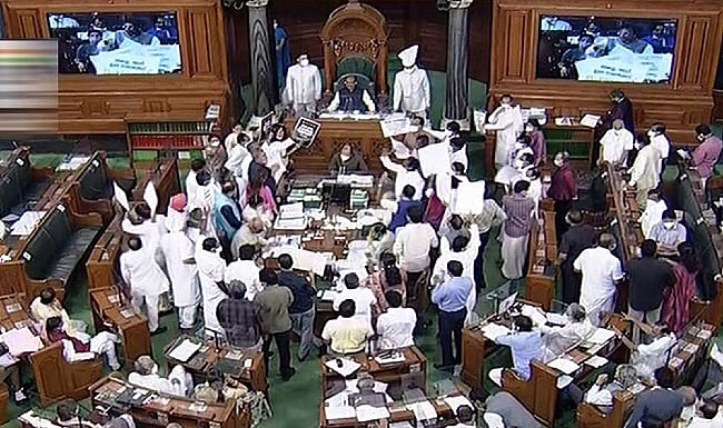 Lok Sabha proceedings disrupted amid Opposition protests