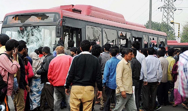 Not allowed to board due to Covid curbs, people damage DTC buses, block MB Road in Delhi