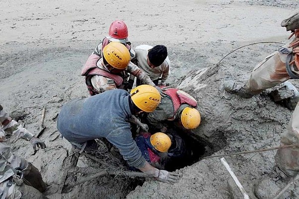 ITBP personnel carry out search and rescue operation at Tapovan Tunnel, after a glacier broke off in Joshimath in Uttarakhand’s Chamoli district causing a massive flood in the Dhauli Ganga river.