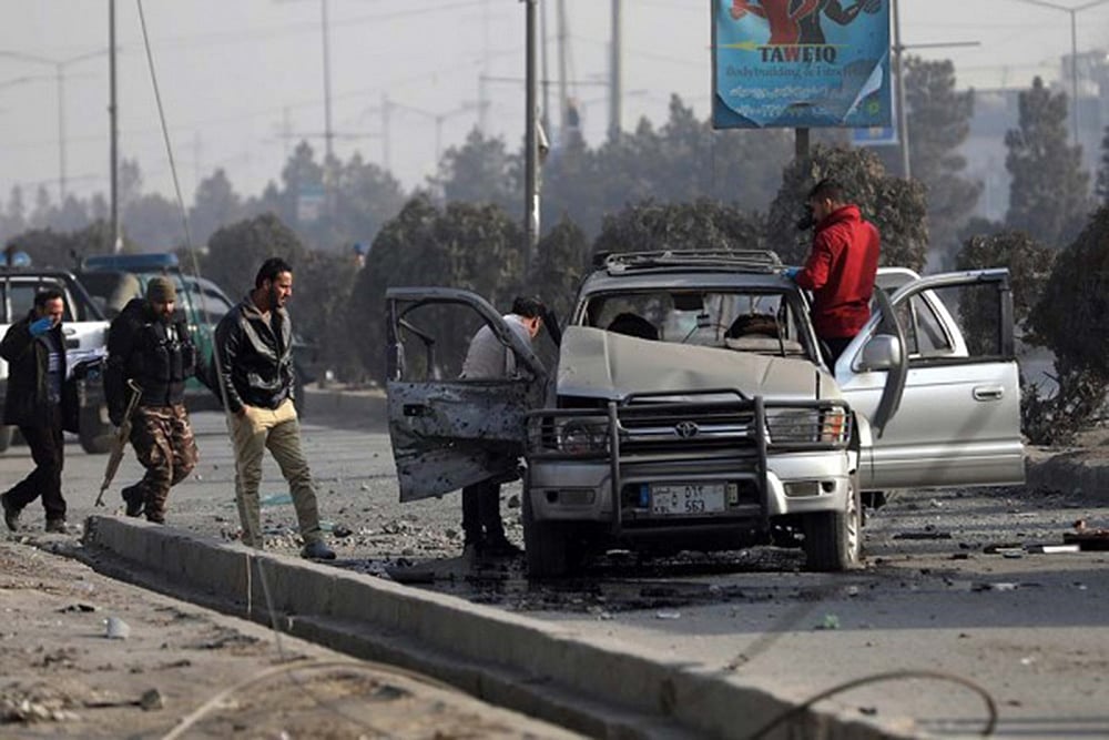 Security personnel inspect the site of a terrorist attack in Kabul 
