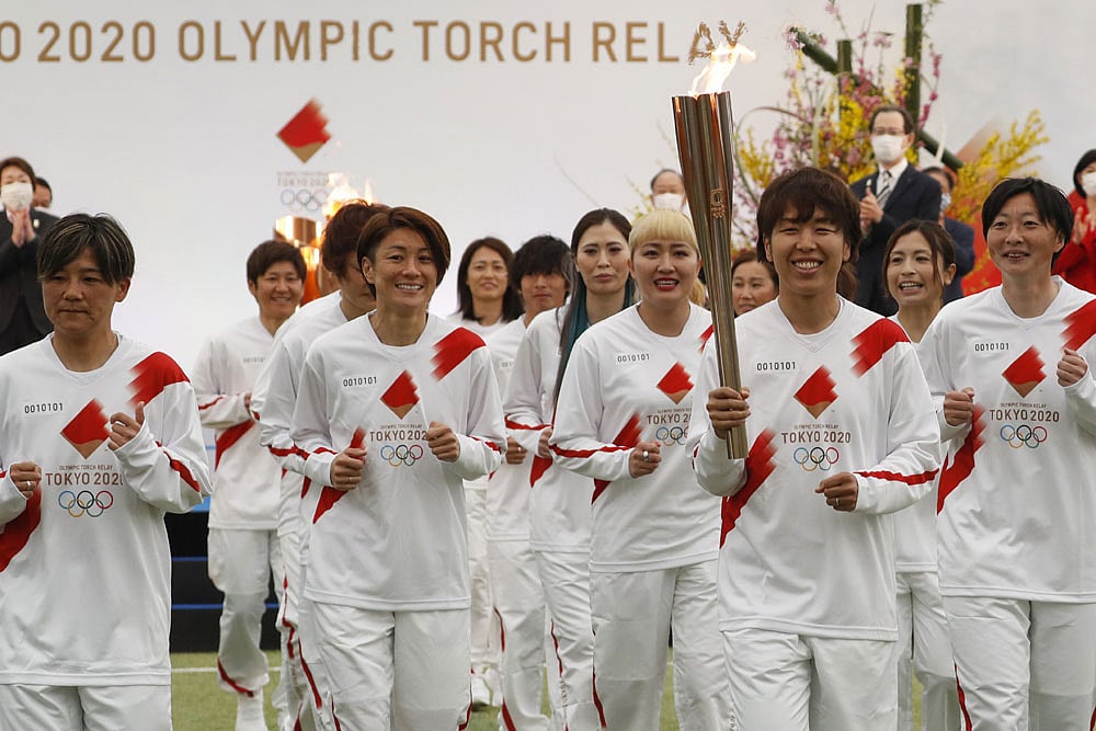 Tokyo Olympics: Torch Relay Kicks Off Its 121-day Journey - WATCH