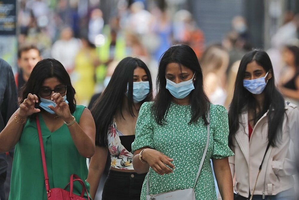 The Mask Is For Covid What The Condom Was For HIV, Say Experts