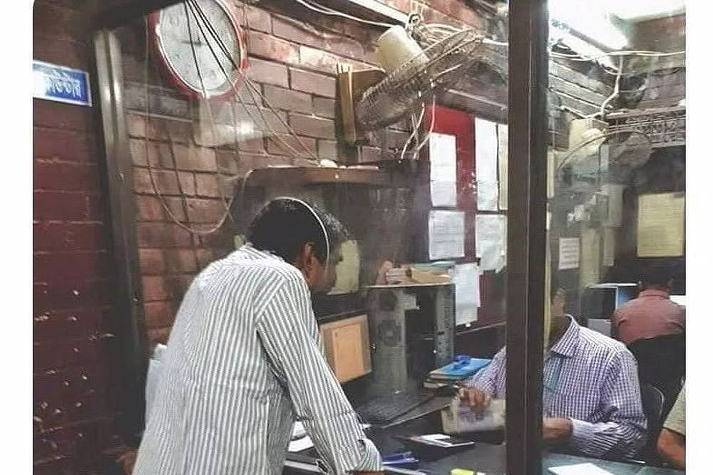 Man Pokes His Head Through Partition Hole, Anand Mahindra Says 'We Are Not Accustomed To Social Distancing'