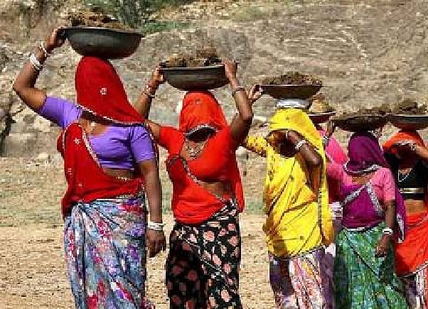 MGNREGA is the Centre's work guarantee scheme for rural people with predetermined minimum wage. 