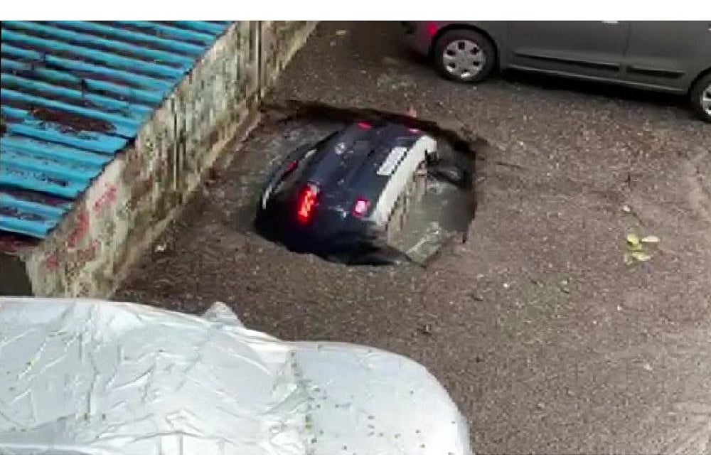 Watch: Concrete Floor Caves In, Car Sinks Into Water, Video Goes Viral
