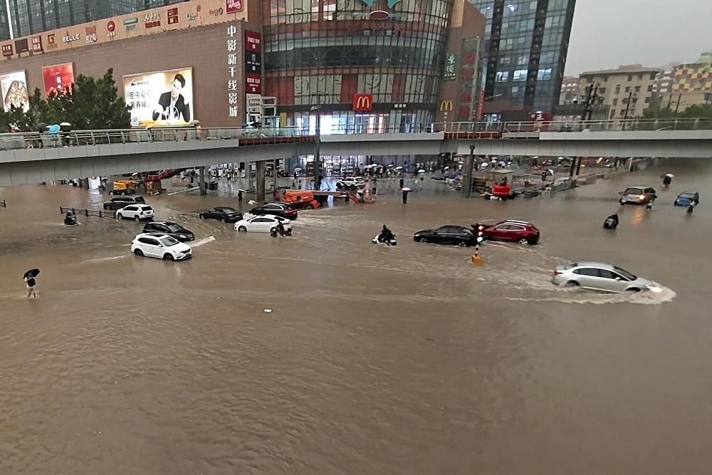Video: Unprecedented Floods In Central China, Passengers Trapped In Subway Trains With Neck-Deep Water