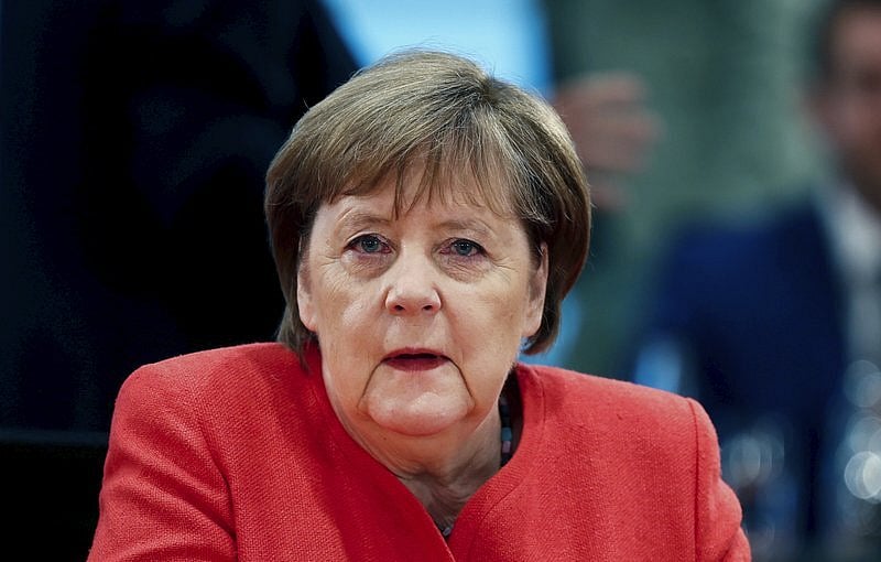 German Chancellor Angela Merkel Steps Down With Legacy Dominated By Tackling Crises