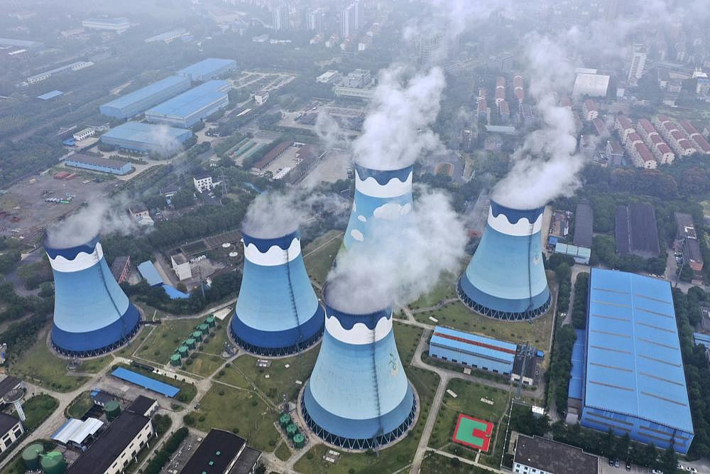 In Meeting Government's Energy Use; Factories, Households Face Darkness In China