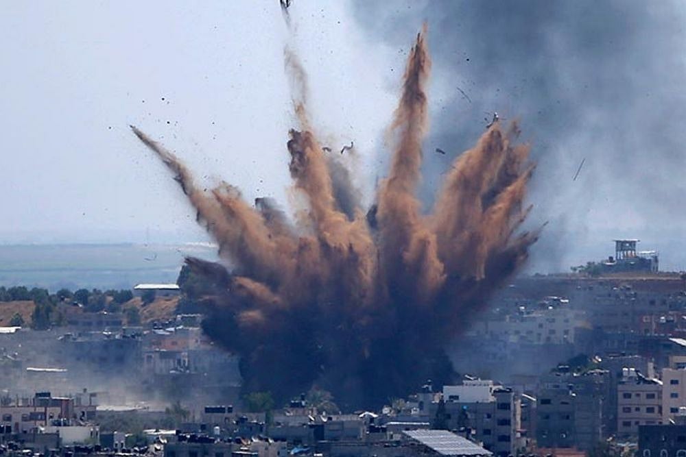 Israel Aircraft Hit Militant Targets In Gaza Strip After Rocket Attack