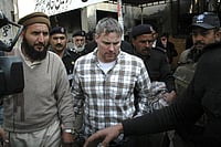 In Jail And In Court, They Defer To Americans In Jail And In Court, They Defer To Americans