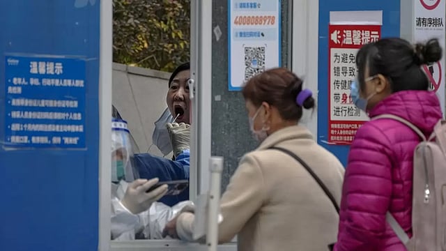 China Faces Covid-19 Surge Amid Rising Unrest