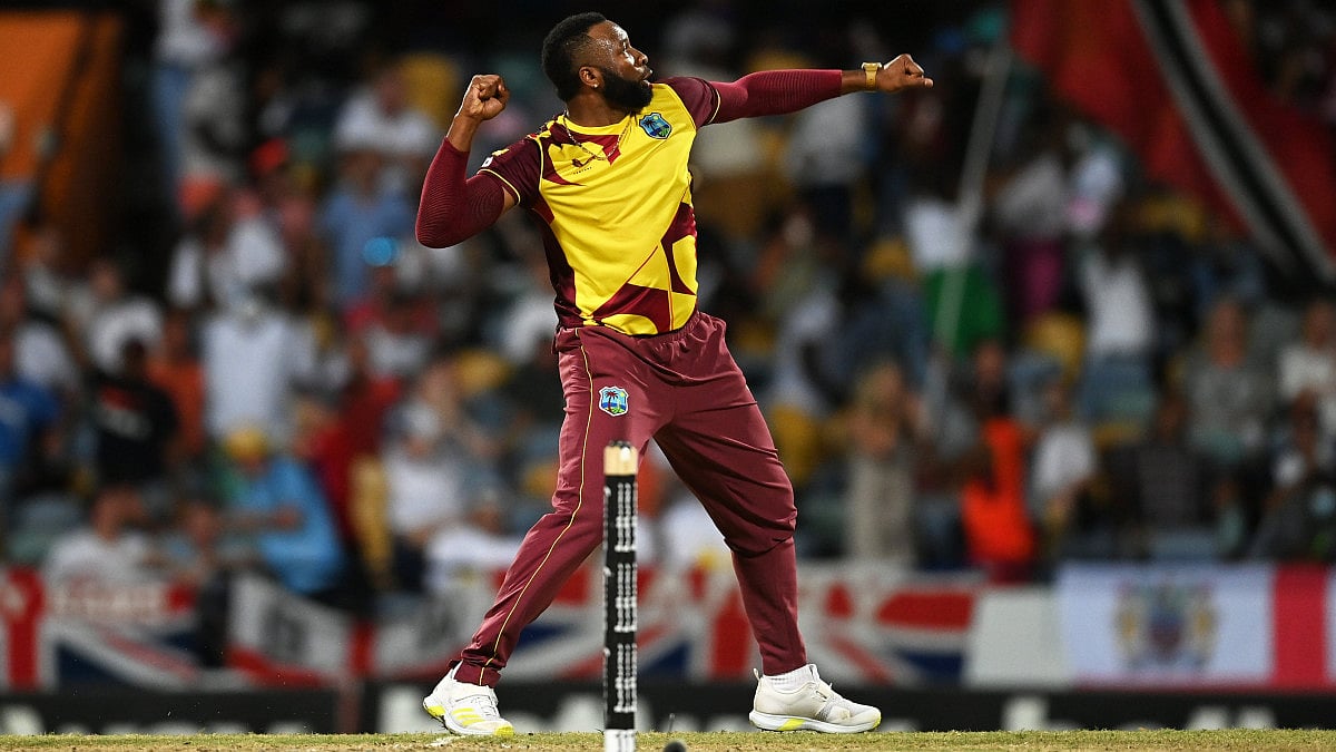 West Indies captain Kieron Pollard celebrates after taking an England wicket in the fourth T20I.