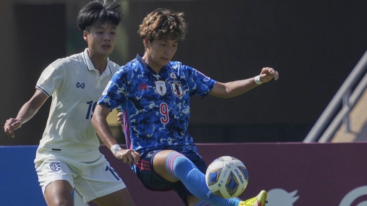 Japan's Yuika Sugasawa in action against Thailand in Mumbai, India.