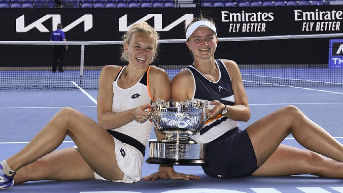 Barbora Krejcikova, right, and Katerina Siniakova with the Australian Open, women's doubles trophy. 