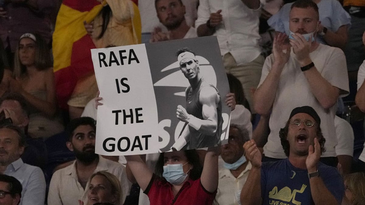 Supporters cheer for Rafael Nadal during the Australian Open 2022, men's singles final match.