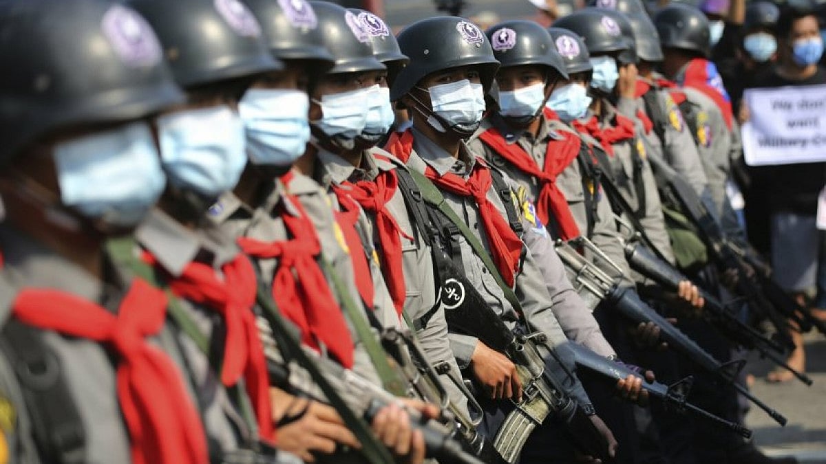Armed riot police are seen near protestors in Naypyitaw, Myanmar on Feb. 8, 2021. (representational image)