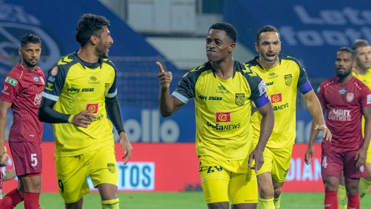 Hyderabad FC's Bartholomew Ogbeche, centre, celebrates after scoring a goal against NorthEast United