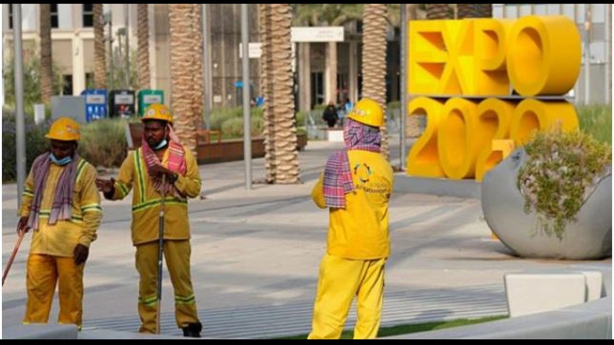 Workers clean an area at Expo 2020 in Dubai, United Arab Emirates, Oct. 3, 2021. 