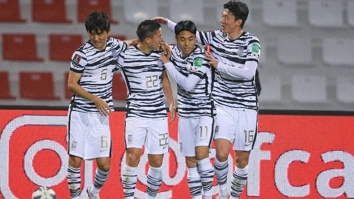 South Korea players celebrate a goal against Syria in their 2022 FIFA World Cup Asian Qualifiers. 