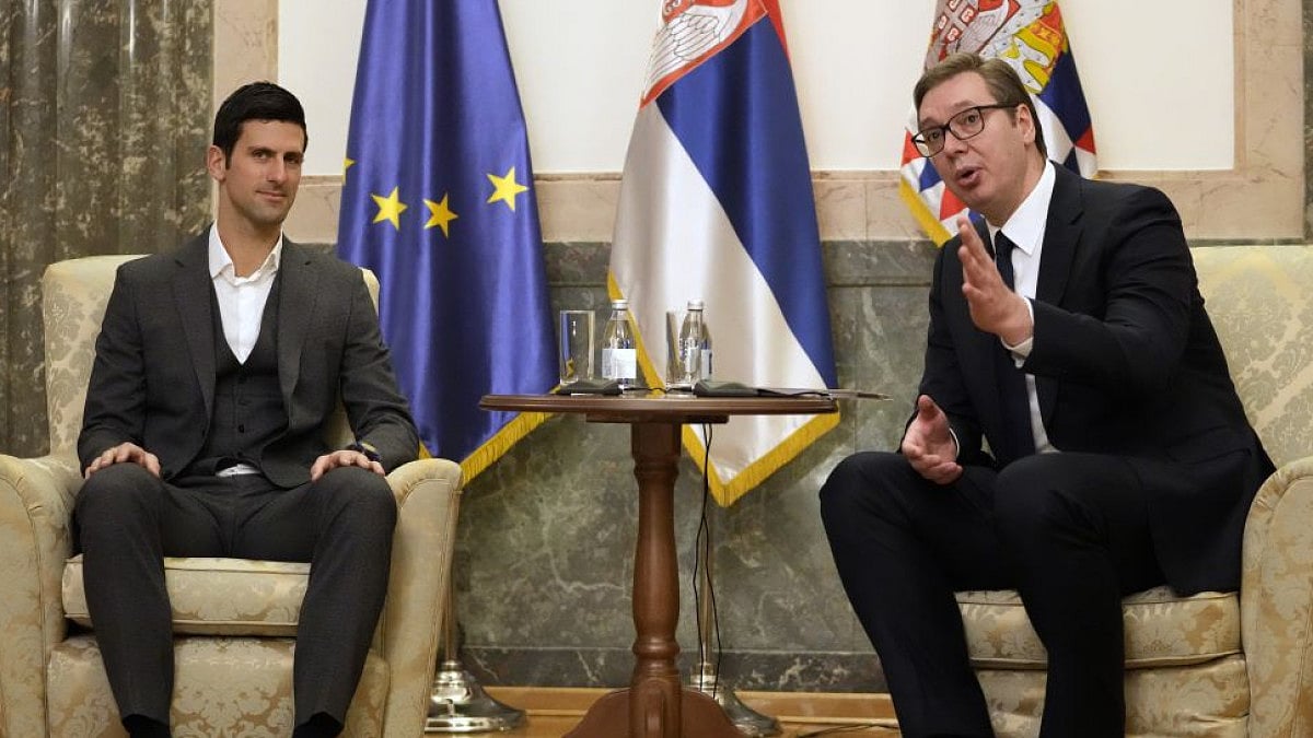 Novak Djokovic (L) speaks with Serbia's President Aleksandar Vucic in Belgrade.