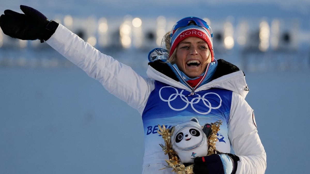 Norway's Therese Johaug reacts after winning 2022 Winter Olympics' first gold.