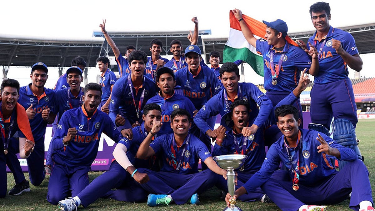 India U-19 cricketers celebrate with the trophy after winning the ICC U-19 World Cup 2022.