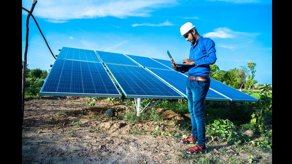 Solar energy panel, technician, engineer, laptop