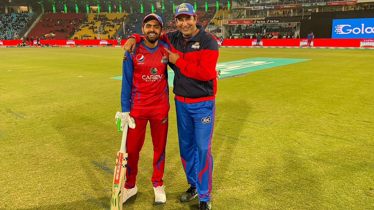 Karachi Kings' Babar Azam and Wasim Akram in all smiles after their win over Lahore Qalandars. 
