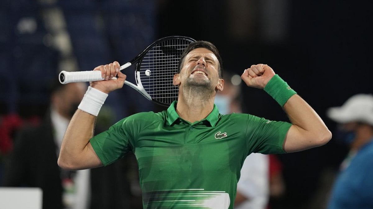 Novak Djokovic celebrates win over Lorenzo Musetti at Dubai Duty Free Tennis Championship.