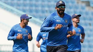 Jasprit Bumrah warms-up during India's training session ahead of first T20 against Sri Lanka.