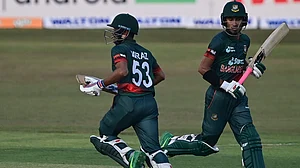 Afif Hossain and Mehidy Hasan take a run in the first ODI against Afghanistan on Wednesday.