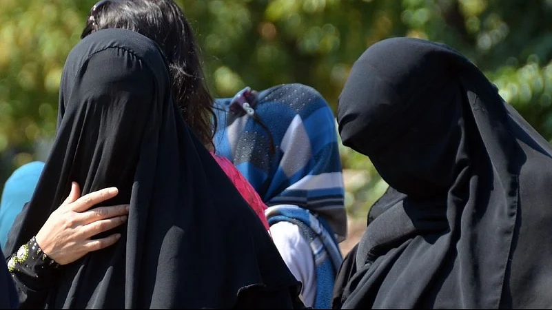 swiss burqa ban, switzerland face covering ban law