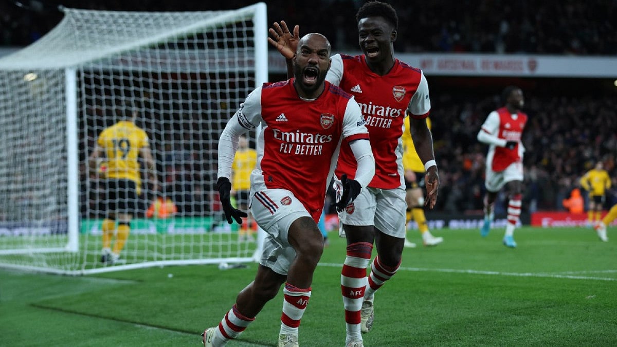 Alexandre Lacazette (L) celebrates after Arsenal's winner against Wolverhampton Wanderers in EPL.