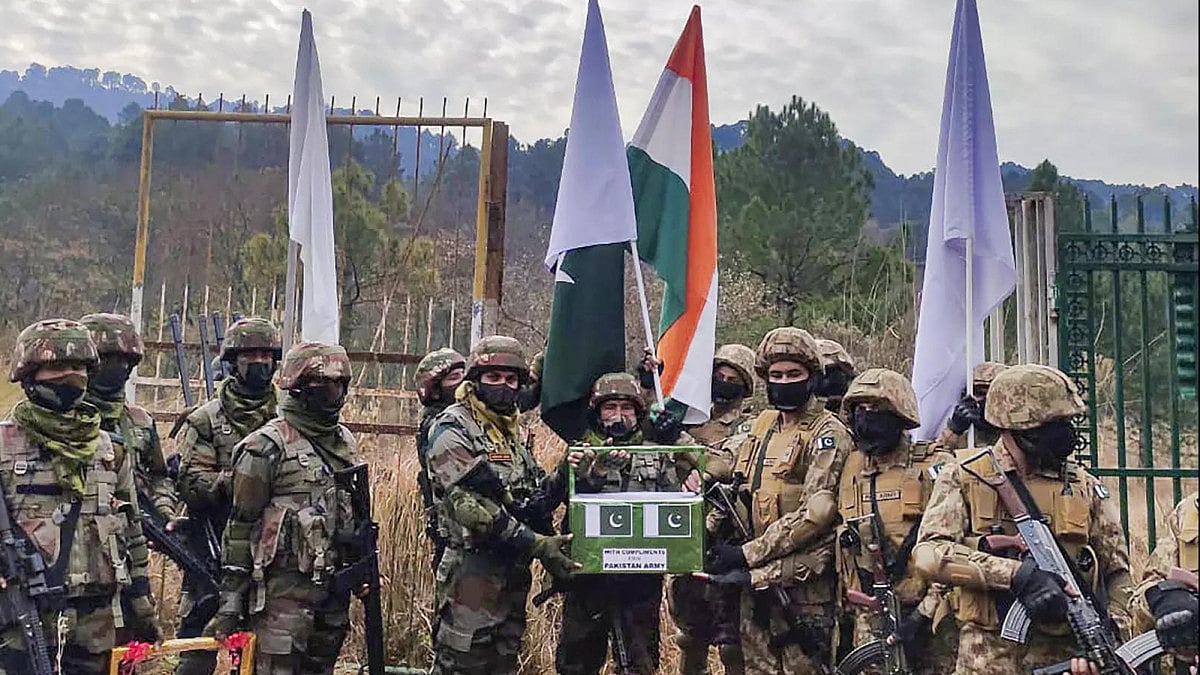 Indian and Pakistani army officers exchange sweets to mark New Year's Day in Poonch area 