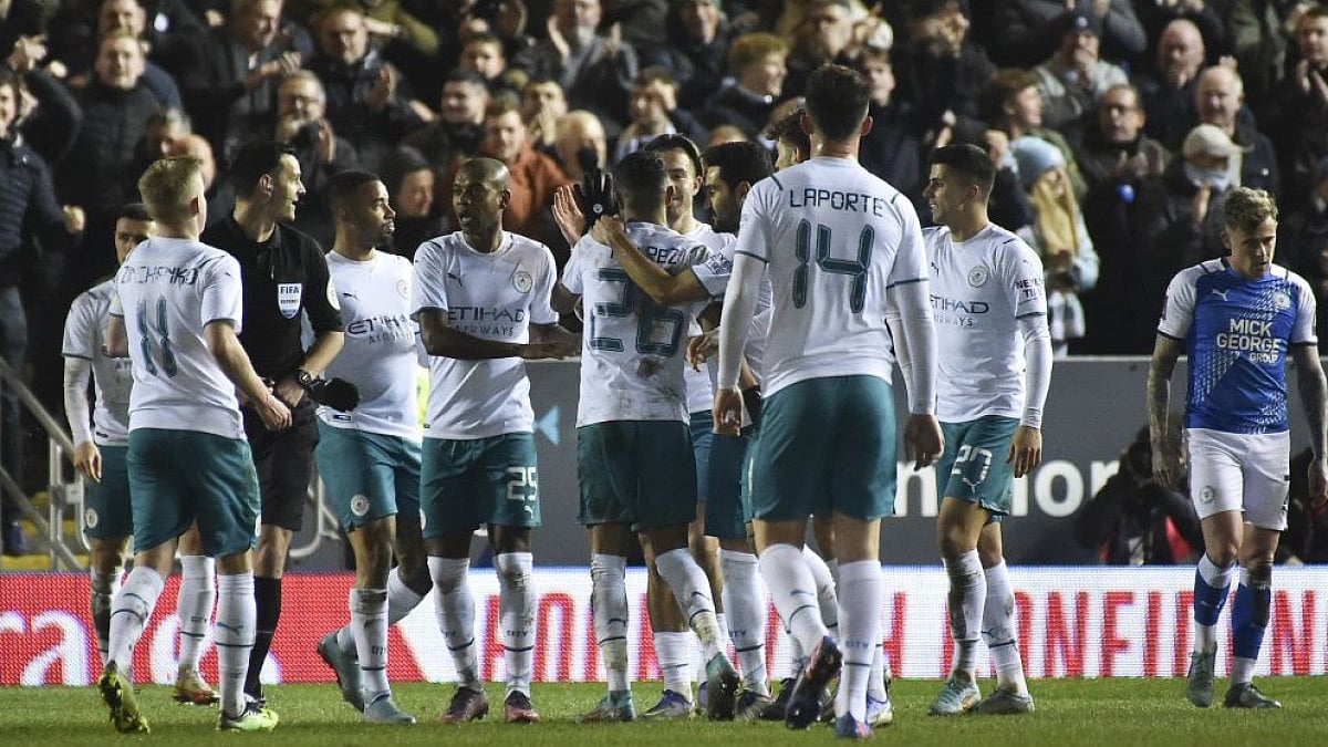 Manchester City players celebrate a goal during FA Cup 5th round match against Peterborough United.