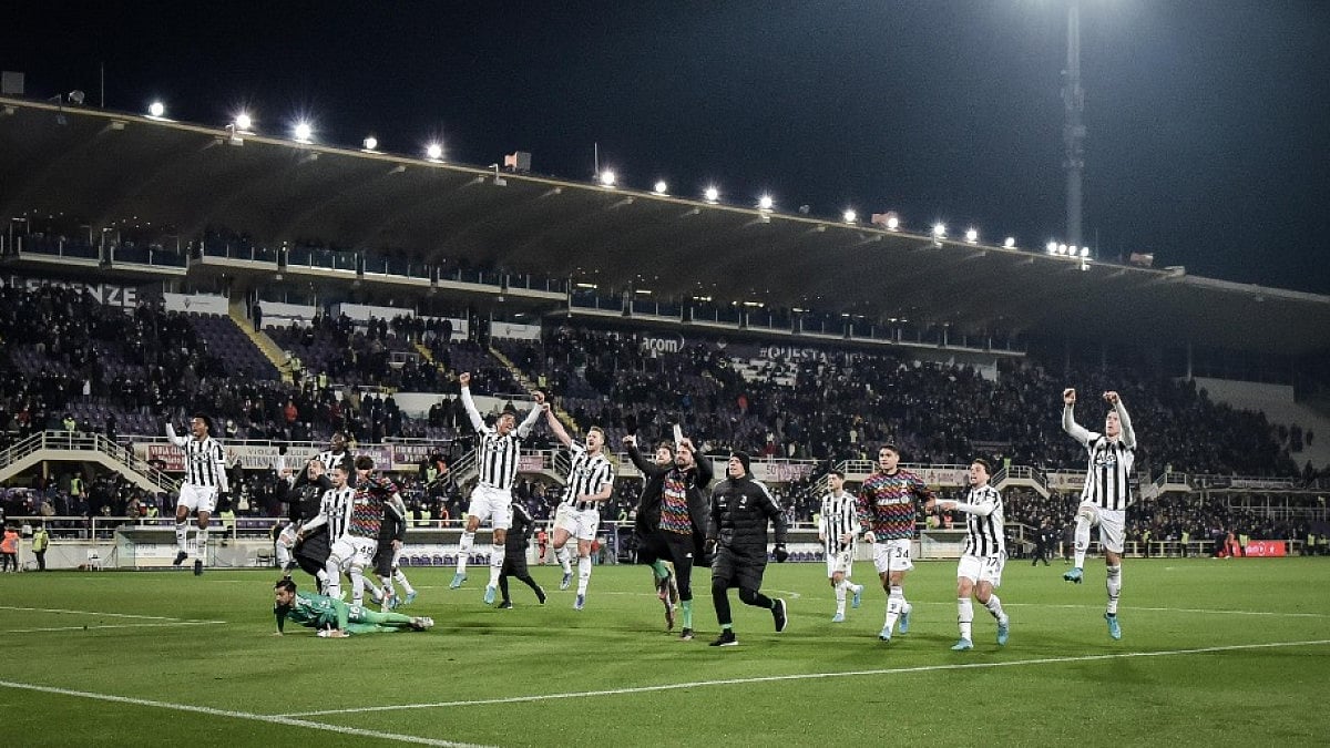 Juventus players celebrate their victory over Fiorentina in Italian Cup 2021-22 semifinal first leg.