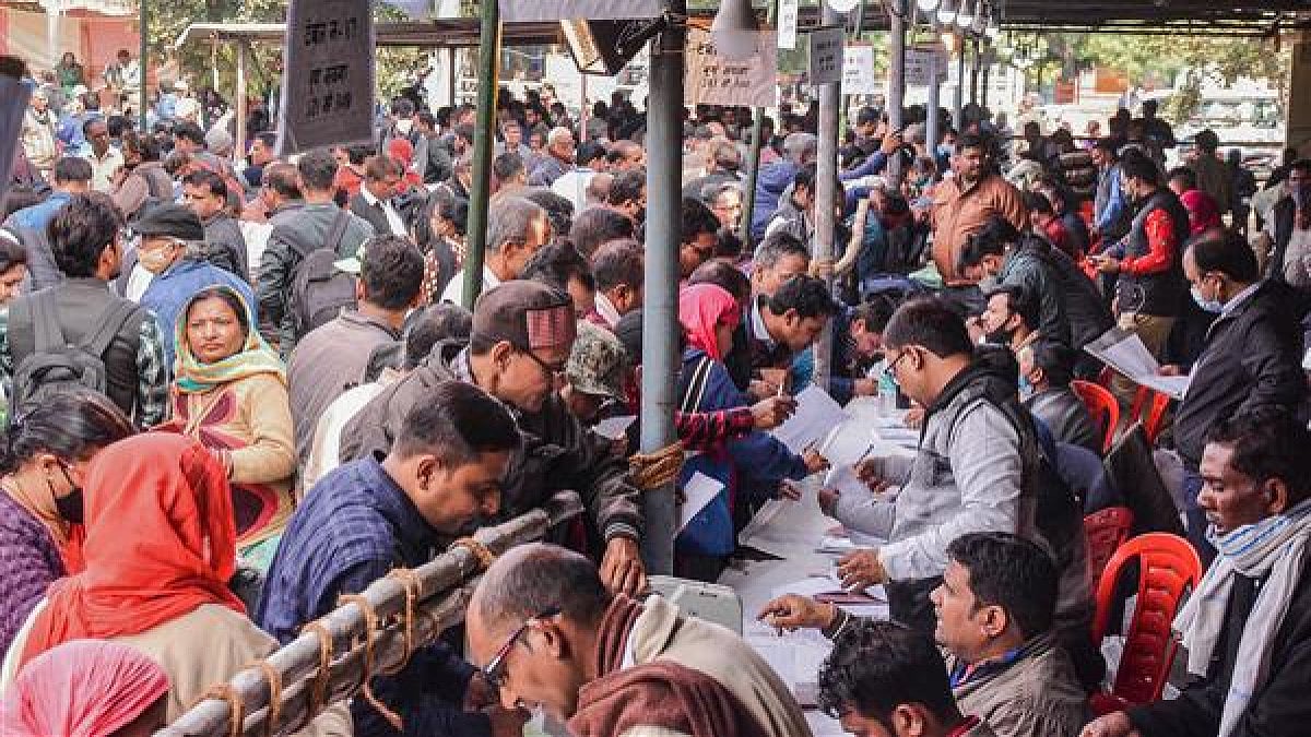 Polling officials at a distribution centre during Uttar Pradesh assembly elections.