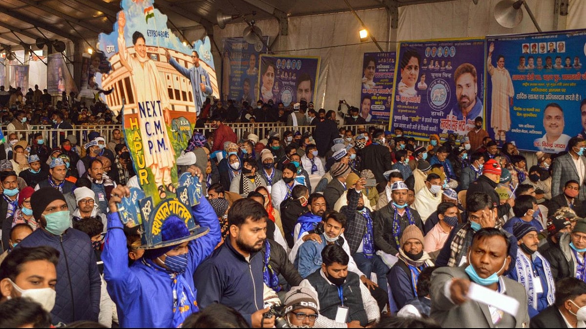 A supporter holds a cut-out of BSP's Mayawati during a meeting ahead of UP polls in Ghaziabad.