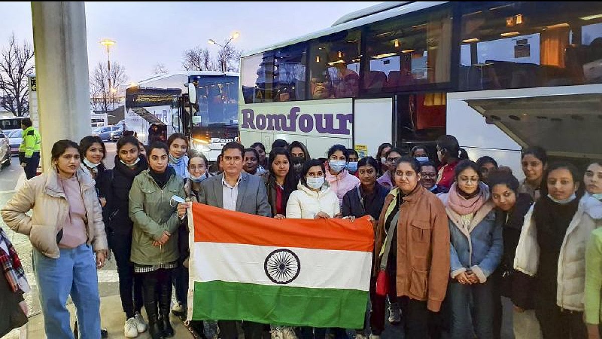 Indians in Ukraine before boarding a special Air India flight for evacuation.