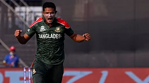 Nasum Ahmed celebrates after taking a wicket vs Afghanistan. Get highlights of BAN vs AFG.